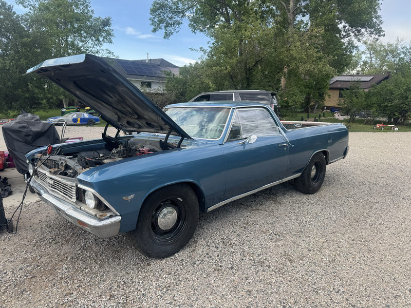 Blue classic Chevrolet El Camino with the hood open