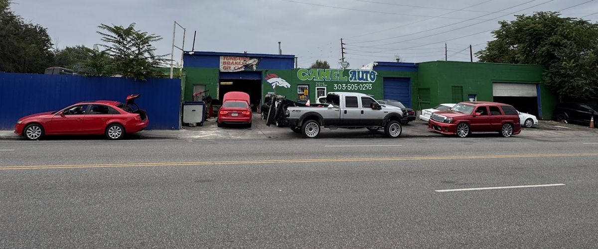 The green Camel Auto shop on West 8th Avenue in Denver